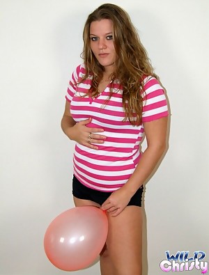 Winsome blonde teen looker Christy playing with balloons on the floor